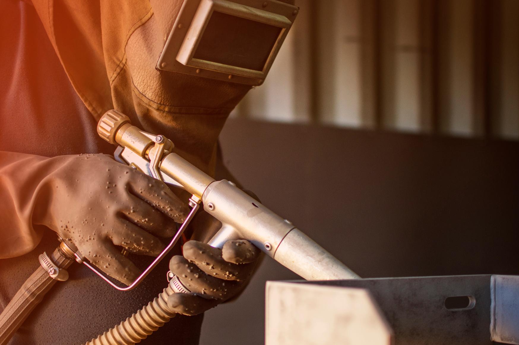 Why Proper Sandblasting and Surface Prep Are Essential Before Refinishing Commercial Machinery